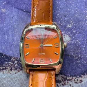 Orange Peugeot Square Quartz Watch with Gold Accents
